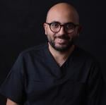 Specialist in Oral Medicine, Dental Implants, and Prosthodontics