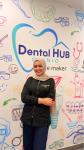 أخصائيه طب الفم و تجميل الاسنان ومتخصصة في علاج الجزور