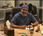 أخصائى طب و جراحة الفم و الأسنان .
