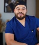 اخصائي طب الفم والاسنان